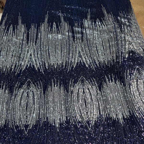tejido-pedreria-lentejuelas-plateadas-tul-azul-marino.jpg
